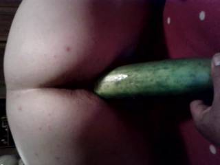 Stretching my pussy on a fat cucumber