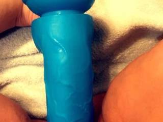 Cathy playing with her big blue dildo