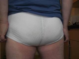 Ladies and gents, feel free to have a good feel of my shorts-clad ass