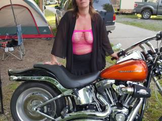 wife posing with the bike in her new top