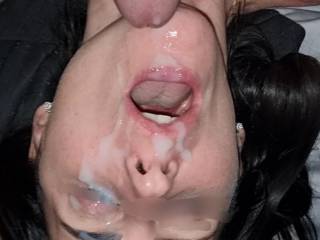 Her face blasted with cum