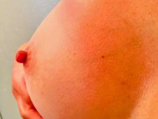 I love when my wife lays out topless at the beach how red her nipple gets ! All the guys stare at her tits and her hard bright red nipples ! Cum to this pic and let us know when you do !