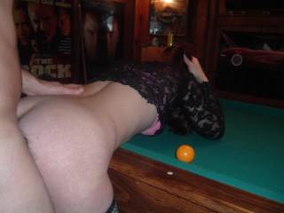 bent over the pool table again