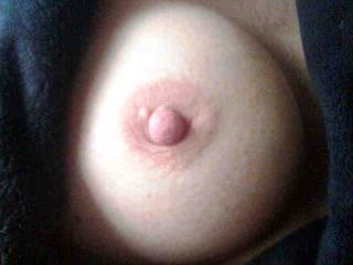 Close-up pic of my wife's big tits and hard nipple.