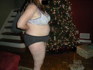 Takin her close off in front of the Tree