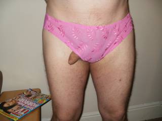 peeking out of sexy pink panties