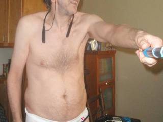 A partial body standing frontal as a selfie of me wearing my undie...September 2025. 1 of 2 Sony 290 cameras is used.