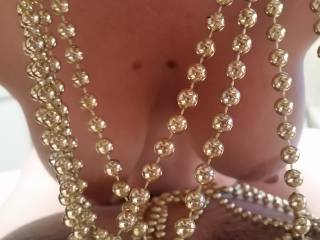 an arty pic of my tits from our xmas fun ....a girls gotta love a little bling