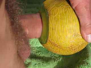 pushing my cock deep into a melon, a great sensation, like deeep throating