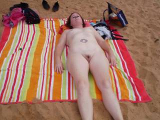 Sunning on nude beach in Maui