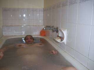 wife relaxing in bath
