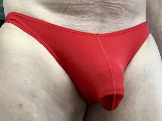 Silky red thong fitting nice and tight on my cock are you coming to set it free ?