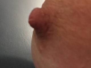 Use that hard nipple to tease the head of my cock.