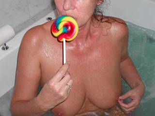 Licking my lolly in the spa of our suite, at a luxury hotel we recently stayed at.