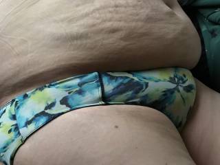 Wife’s phat pussy putting the strain on floral print panties, big wobbly belly looming