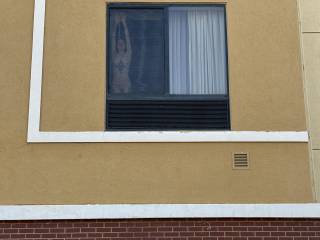 Having in some fun in a hotel window!