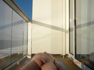 On the balcony tanning in Bernuda