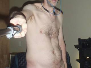 Scenes from my last toy play session of 2020...November.I am taking a standing selfie as I undress.Pic taken with an Olympus camera.