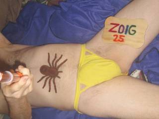 A partial body selfie of me wearing my undie as I am on my bed. Sony W290 camera was used.