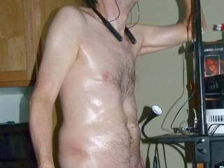 A partial body frontal/side as I stand on a step, adjusting/setting up one of my S70 camera`s... May 2ND 2025. FZ100 camera was used.