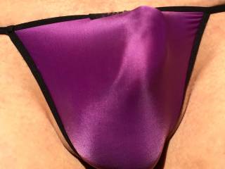 my smooth bulge beneath this silky-smooth purple silk g-string