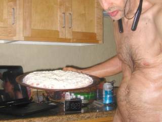 A partial body frontal as I stand near my stove with a pizza on May 1ST 2025. A S70 camera was used.