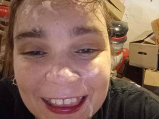 Just a happy girl with a face covered in cum