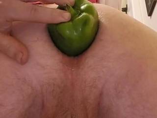 Found a narrow green pepper that fit perfectly in my ass