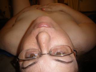 Would love to feel your mouth on my balls while I cum all over your tits!

But there is something really fun about cumming on your glasses...  oh, choices, choices!