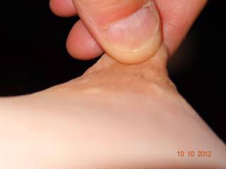 hubby pulling on my nipple