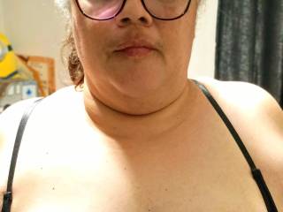 Putting on her new bra on our way out.