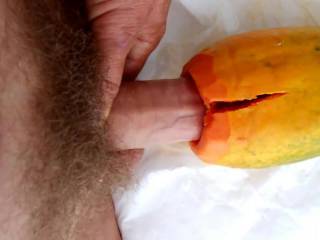 Slowly penetrating a very juicy fleshy papaya - incredible feeling, but the fruit did\'nt resist long ...
