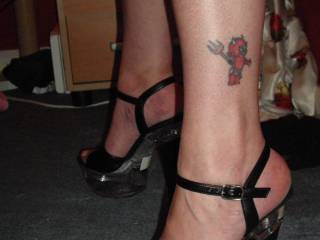 You have extremely sexy legs, in fact your picture is in the dictionary next to the word sexy. Love your ink, it is so fitting, your such a sex loving devil