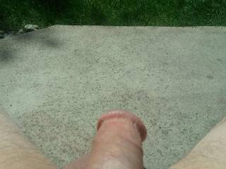 Sitting on the patio tanning my cock.