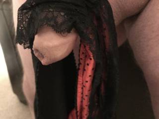 Lacy panties teasing my sated cock.