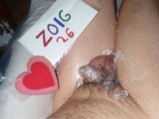 An above view of my smaller dick that has lube upon it and my skin has lube... but, barely any lube on my balls in this scene... A Z50 camera was used.