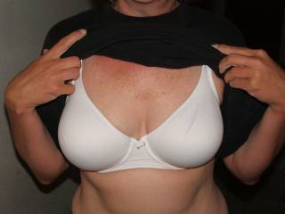 plain bra ready to be taken off.