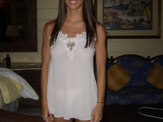 just a simple shot of Caitlin on our honeymoon in lingerie.  has anyone seen her on the net before?