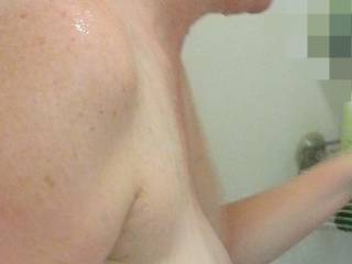 Huge milk filled right boob in the shower