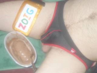 Sitting with ice cream and my balls are showing through one of my new undie garments.