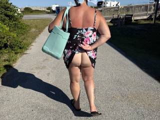 Me showing him my ass coming back from the shower house.  He fucked me in the outdoor shower but I showed him I wanted more!