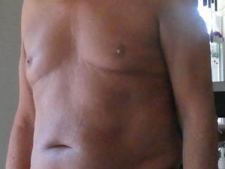 Naked with a hard cock.