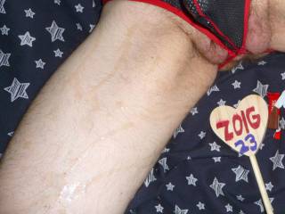 Sitting in my recliner, a close up of my undie pouch with cum on my skin & balls visible and a Kit Kat Thin bar. Camera used, Z50.
