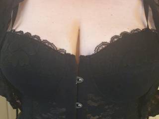 loving my new wench bustier hugging my breasts nice and tight