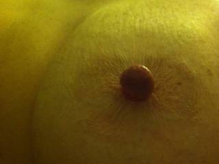 close up of her hard hard nipples, had one of those hair ties/rubber bands around her nipples. she loved it.