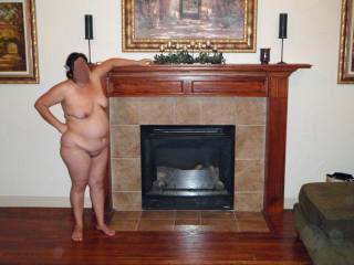 Nude in front of the fireplace...cum make my pussy burn!