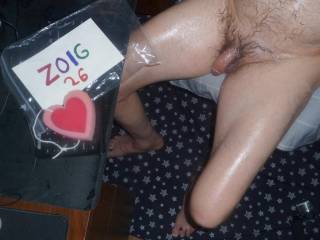 After my first toy play, I am sitting at my desk/PC with my legs spread apart... with lube upon my dick, hair and skin. Z50 camera was used.