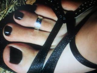 Gorgeous especially love the toe ring...would live to feel it sliding back and forth over the head of my cock. Sexy feet n toes beautiful!