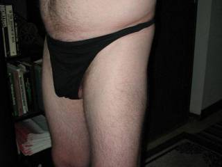 a side frontal view of my black undies...you can barely see my balls hanging down...July 3,207