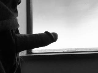 Looking out the window.